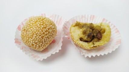 Indonesian tradisional food onde onde or sesame ball with mung bean filling isolated on white background