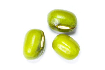 Green mung beans isolated on white background. Top view. Flat lay.
