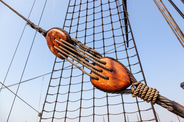 sailing ship wooden block and tackle with hemp rope