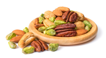 unsalted mixed nuts in the wooden plate, isolated on white background