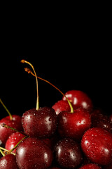 Fresh ripe cherry cherries with water drops
