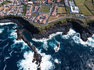Top view of the ocean surf on the reefs coast – San Miguel island, Azores, Portugal.