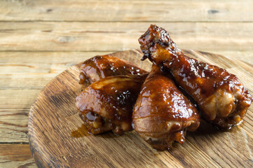 chicken legs fried in a sweet and spicy sauce.