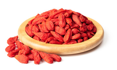 Dried Chinese wolfberries in the wooden bowl, isolated on white