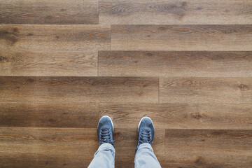 Brown painted natural wood with grains on floor for parquet background, banner and texture.