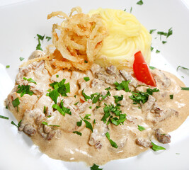 Beef stroganoff classic. Beef tenderloin with cream sauce
