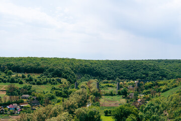 View of the ruins of the old-time viaduct, aqueduct, tourist route Podilsky Tovtra, Ukraine, Khmelnitsky region, Zubrivka village.