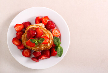 Pancakes with strawberry topping
