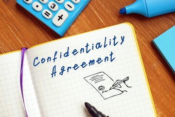 Career concept meaning Confidentiality Agreement with inscription on the piece of paper.