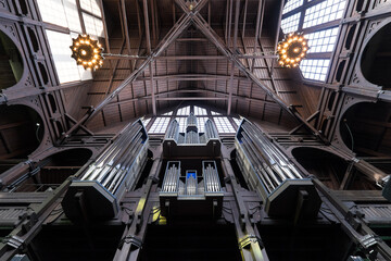 Ceiling and organ in the interior of Kiruna Church in Kiruna, Sweden. It is one of Sweden's largest wooden buildings