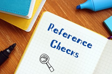 Business concept about Reference Checks with phrase on the sheet.