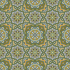 Seamless ornamental oriental pattern with mandala. Laced decorative background with floral and geometric ornament.