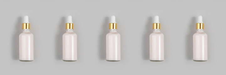Banner made with pink anti-aging collagen, facial serum in transparent glass bottle with gold pipette on grey background. Natural Organic Spa Cosmetic Beauty Concept