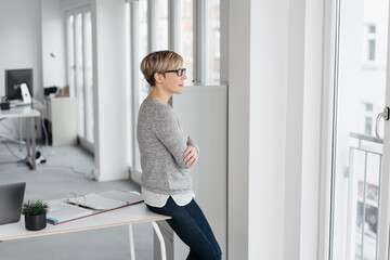 Businesswoman taking a break in the office