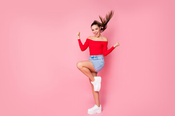 Full length body size view of her she nice-looking attractive lovely pretty charming slim fit thin slender cheerful cheery girl celebrating having fun isolated over pink pastel color background