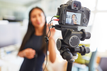 Business woman video recording for streaming