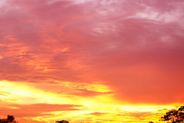 Bright orange and yellow colors sunset sky