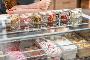 Various food additives in the form of topping for ice cream, close-up