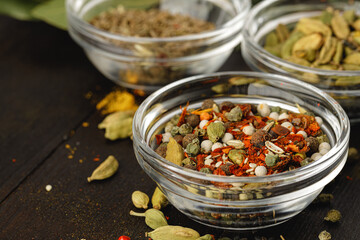 Green spice in glass bowl close up on kitchen table