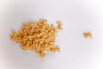 Obraz premium Pasta on a white background. bow. Variety of types and shapes of Italian pasta.