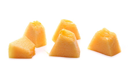 Cantaloupe, muskmelon, honeydew slices, pieces isolated on white background