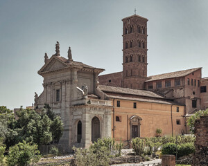 Fototapeta na wymiar Rome Italy, the Basilica of Santa Franchesca Romana and tower in the Roman Forum