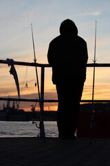 Wędkarz w porcie © Katarzyna