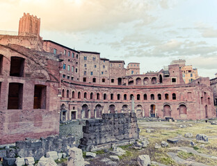 Obraz premium golden hour in Rome Italy, the Trajan's forum and market view with militias tower on the background