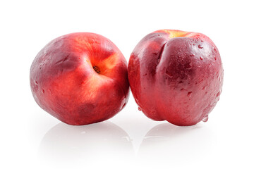 ripe nectarine peach fruits isolated on white