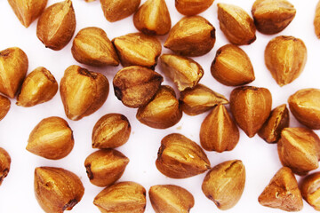 buckwheat grain isolated on white background close up. Top view