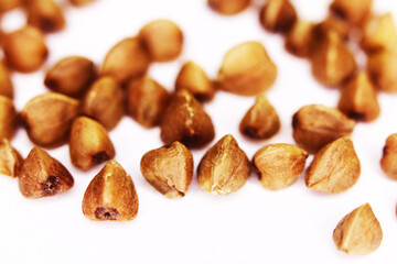 buckwheat grain isolated on white background close up. Top view