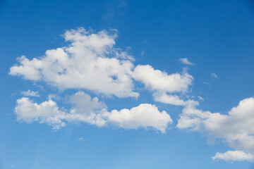 Naklejka na ściany i meble White cloud in the sky