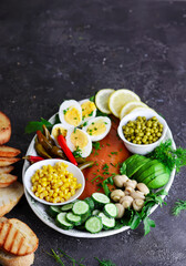 Salmon platter with vegetables and eggs  .selective focus