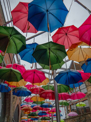 Fototapeta na wymiar Umbrellas decorating the street