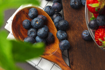 Close up photo of blueberries and strawberries