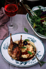 Quail with polenta and cranberry sauce.selective focus