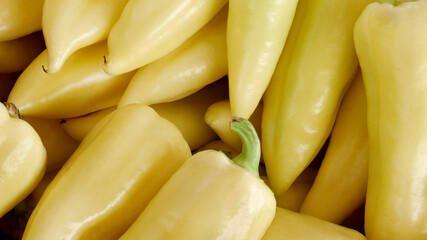 Macro photo of sweet yellow pepper at the rural market