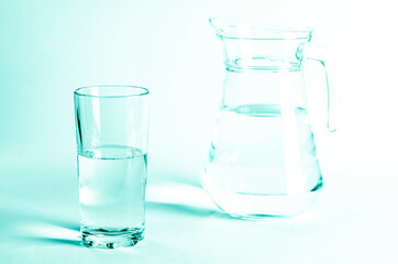 Glass with clean clear water on a white background