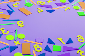 Colorful figures and numbers for children on a pink background. A tool for developing children's thinking.