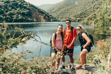 Young hikers in mountainous landscape.
