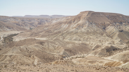 Mitzpe Ramon dry canyon landscape in the Negev desert of Israel.