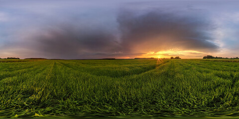 Fototapeta na wymiar full spherical hdr panorama 360 degrees angle view among fields in summer evening sunset with beautiful clouds before storm in equirectangular projection, ready for VR AR virtual reality