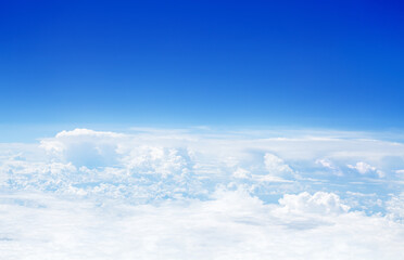 White cumulus clouds clear blue sky background, aerial beauty cloudscape panoramic view from above, high azure skies panorama, fluffy cloud backdrop, sunny heaven, cloudy flight landscape, copy space