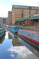 Narrow boats in Gloucester Docks Canal Basin, England	