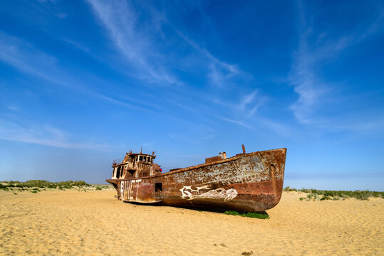 Moynaq, Uzbekistan - 08 May 2019: Ship wrecks in the dead Aral Sea in Monyak
