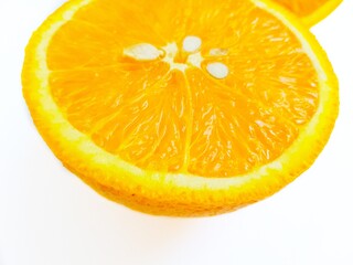 Juicy bright sweet orange on a white background close-up. Place for the buyer's text.