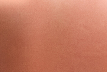 Textured copper, brass or bronze background.