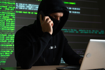 hacker using mobile smartphone calling for victim