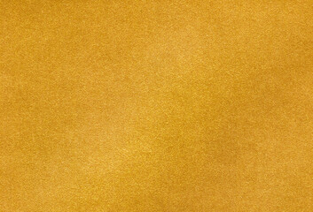 Close up view of textured golden creative paper background. Extra large highly detailed image.
