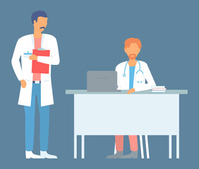 Obraz premium Meeting of two doctors in medical office. Consultation and diagnosis. Doctor with clipboard talking to medical man sitting at the computer at hospital office. Clinic appointment meeting with doctor